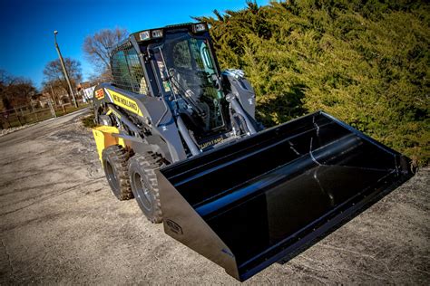 used new holland skid steer buckets|new holland skid steer website.